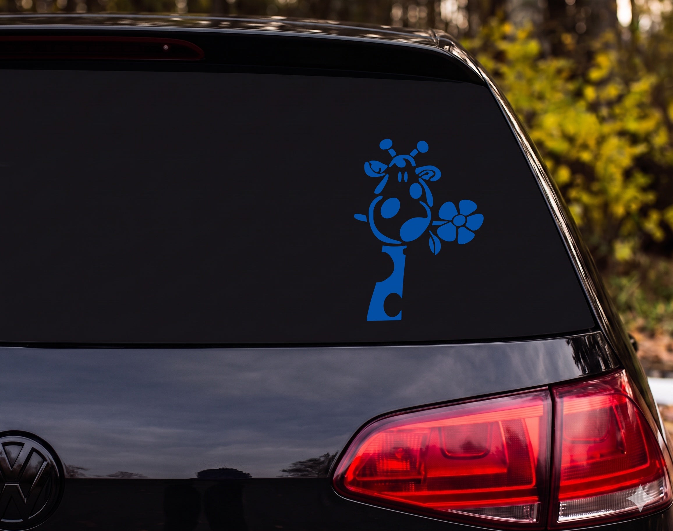 Cartoon Giraffe Head Silhouette Sniffing Flower Whimsical Vinyl Decal Sticker - Blue