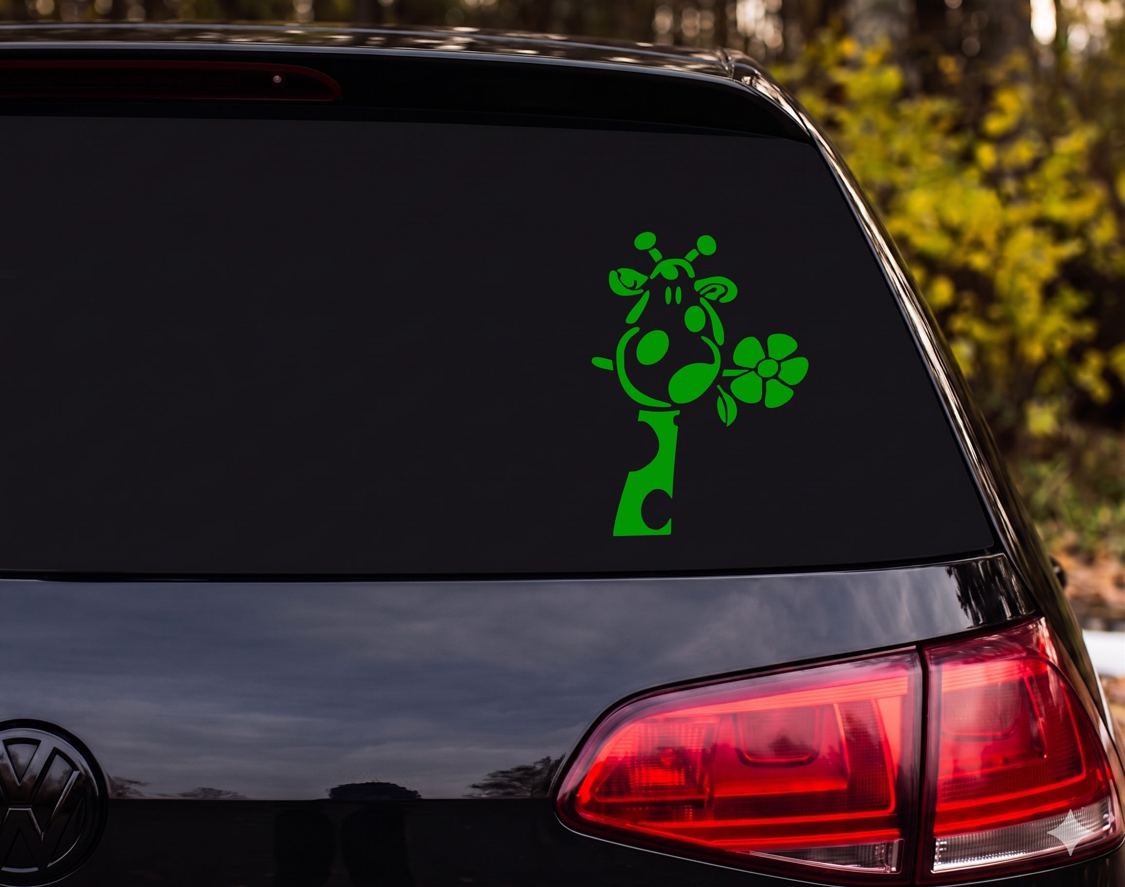 Cartoon Giraffe Head Silhouette Sniffing Flower Whimsical Vinyl Decal Sticker - Green