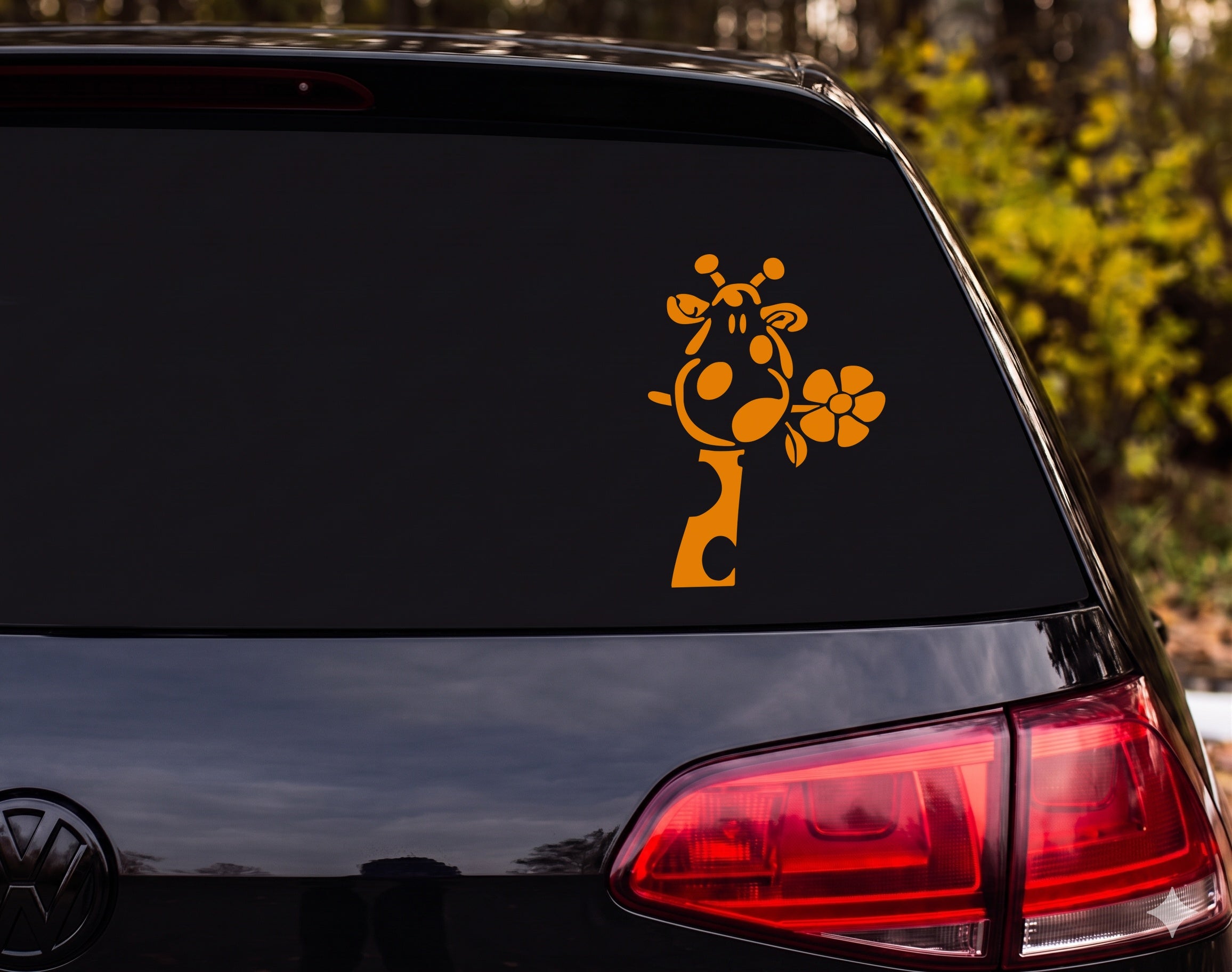 Cartoon Giraffe Head Silhouette Sniffing Flower Whimsical Vinyl Decal Sticker - Orange