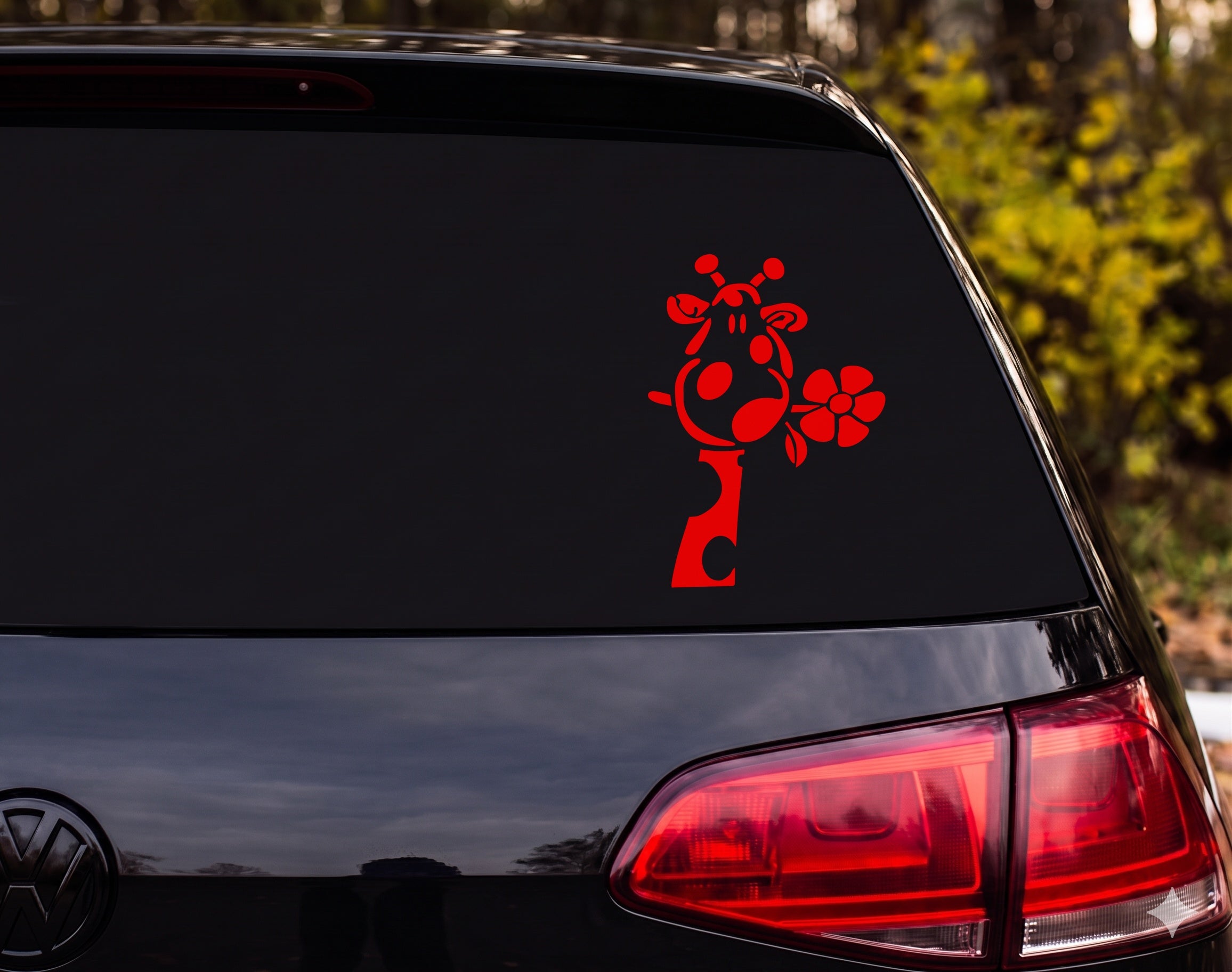 Cartoon Giraffe Head Silhouette Sniffing Flower Whimsical Vinyl Decal Sticker - Red