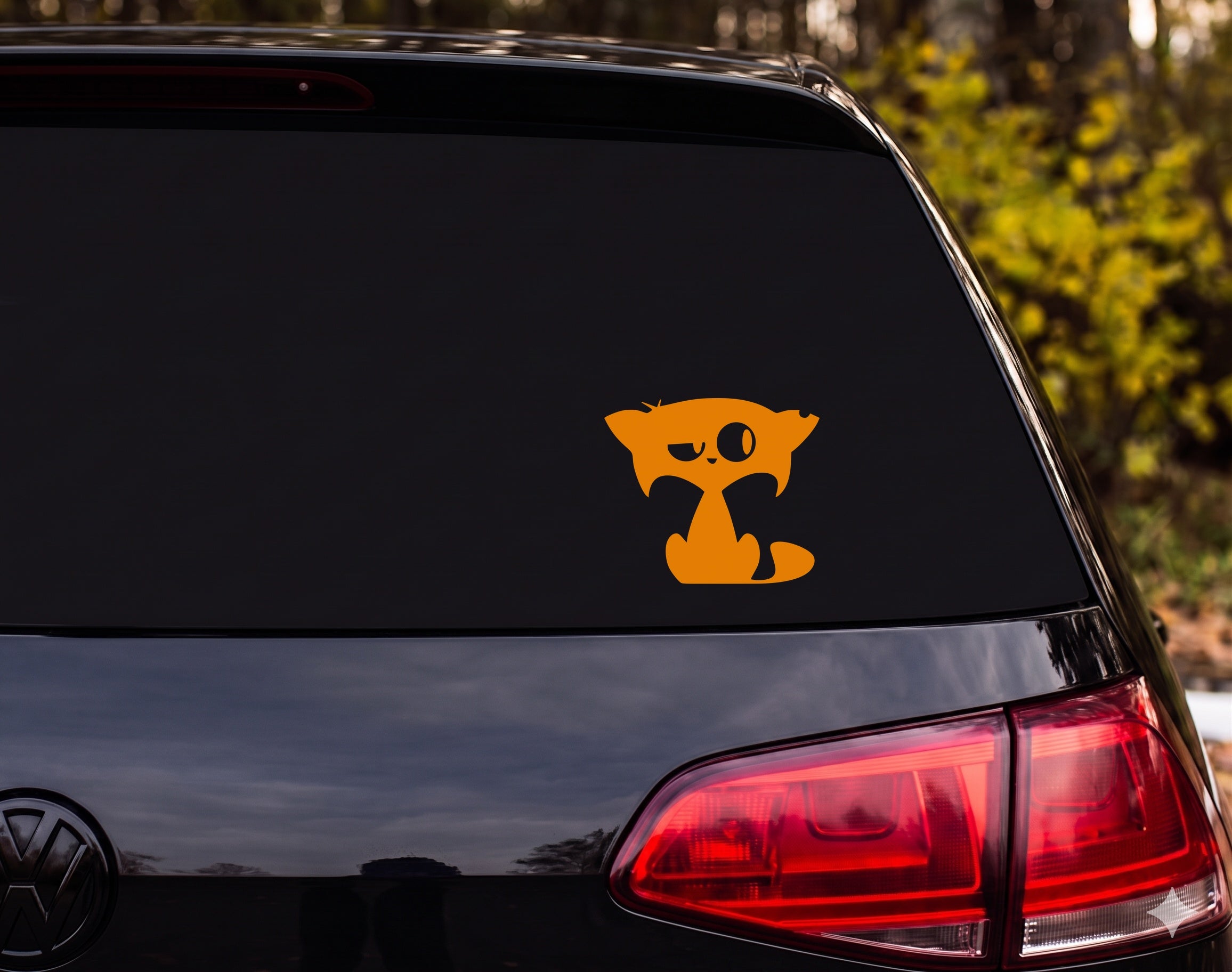 Quirky Cartoon Cat Silhouette Lopsided Eyes Sitting Vinyl Decal Sticker - Orange
